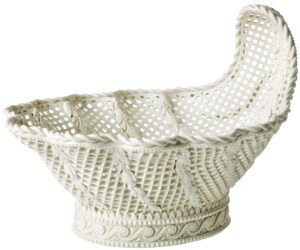 White ceramic latticework bowl, crested at one end.