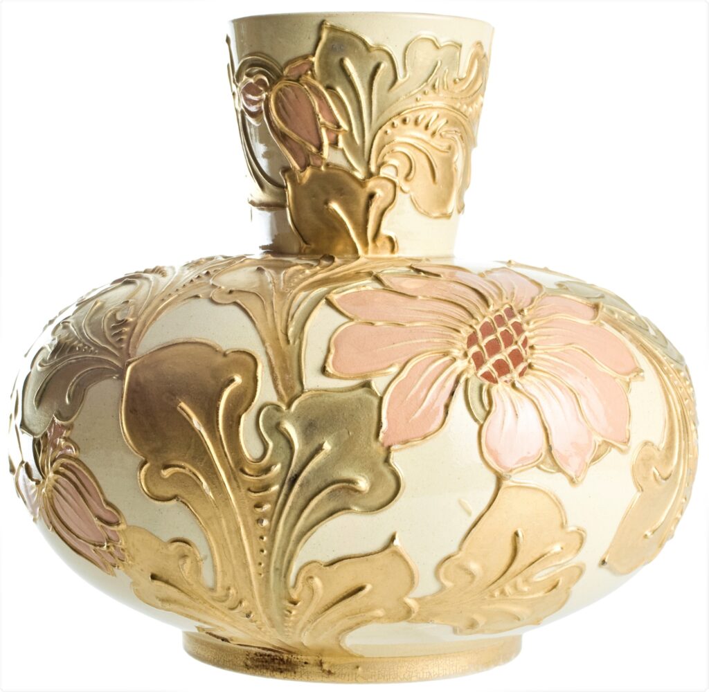 A narrow-necked, wide-bodied vase with golden floral decoration.
