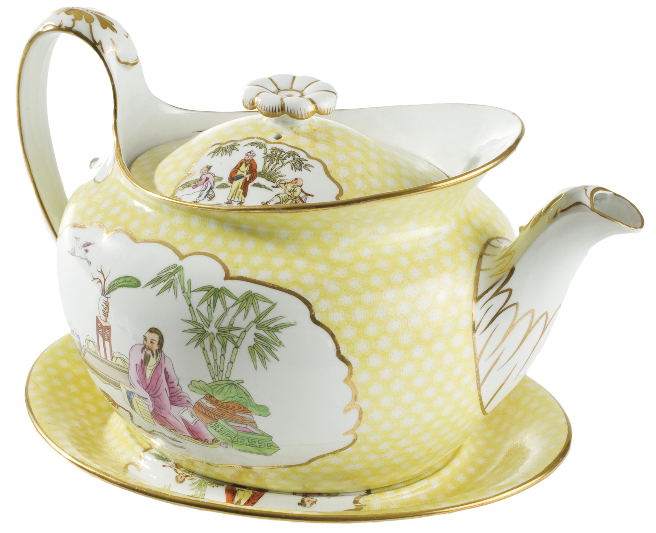 Yellow and white teapot and saucer.