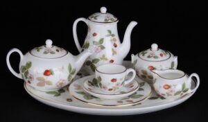Tea set with strawberry pattern.
